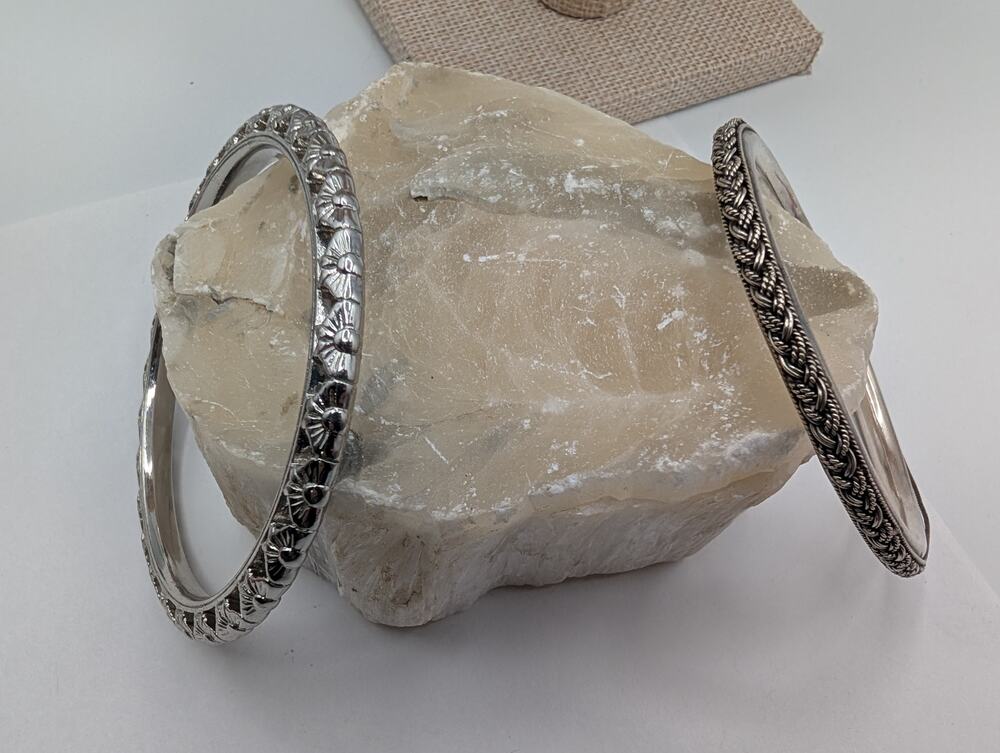 Set of 2 Silver Tone Bangle Bracelets - Braided & Floral Embossed Fashion